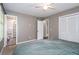 Bedroom featuring an ensuite bathroom, neutral decor, and closet space at 2884 Bent Creek Nw Dr, Kennesaw, GA 30152