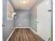 Functional laundry room with ample space, hardwood floors, a window for natural light, and a convenient layout at 2884 Bent Creek Nw Dr, Kennesaw, GA 30152