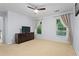 Spacious bedroom with large windows and neutral carpeting at 2910 Leeds Garden Ln, Alpharetta, GA 30022