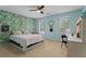 Bedroom with leafy green wallpaper and plentiful natural light at 2910 Leeds Garden Ln, Alpharetta, GA 30022