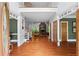 Elegant foyer with hardwood floors and staircase, leading to a spacious living area at 2910 Leeds Garden Ln, Alpharetta, GA 30022