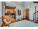 Open-concept living space with a view of the kitchen and a spiral staircase at 30 5Th Ne St # 1006, Atlanta, GA 30308
