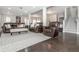 Basement space with durable flooring, comfortable leather seating, and bright lighting, great for leisure or recreation at 4840 Chase Ln, Cumming, GA 30040
