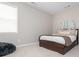 Bedroom featuring neutral colors, a large window, and carpeted floors at 4840 Chase Ln, Cumming, GA 30040