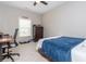 Bedroom featuring neutral colors, a window, carpet, desk, and dresser at 4840 Chase Ln, Cumming, GA 30040