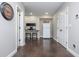 Hallway features modern appliances, a desk area, and ample storage, enhancing functionality and convenience at 4840 Chase Ln, Cumming, GA 30040