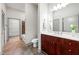 Modern bathroom featuring a sleek vanity with sink, toilet, and tiled shower/tub combination at , Atlanta, GA 30313