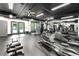 Well-equipped fitness center with cardio machines, weights, and ample natural light at , Atlanta, GA 30313