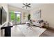 Bright living room with hardwood floors, comfortable seating, and access to a balcony at , Atlanta, GA 30313