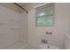 This renovated bathroom features a walk-in shower and bright lighting at 1539 Pine Glen Cir, Decatur, GA 30035