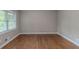 Large living room featuring refinished hardwood floors at 1539 Pine Glen Cir, Decatur, GA 30035