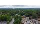An aerial view capturing townhomes nestled among verdant trees, offering a serene and private living environment at 1949 Townsend Ne Ct # 22, Atlanta, GA 30329