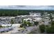 A captivating aerial shot capturing the bustling commercial area with retail stores and ample parking at 1949 Townsend Ne Ct # 22, Atlanta, GA 30329