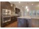 Modern kitchen boasts granite countertops, stainless steel appliances and dark wood cabinetry at 1949 Townsend Ne Ct # 22, Atlanta, GA 30329