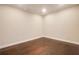 Empty room with hardwood floors, white trim, and plenty of natural light at 1949 Townsend Ne Ct # 22, Atlanta, GA 30329