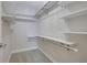 Walk-in closet with wire shelving and hanging rods for optimal storage and organization at 1949 Townsend Ne Ct # 22, Atlanta, GA 30329
