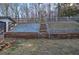 Spacious backyard featuring tiered retaining walls and stairway at 52 Buena Vista Se Cir, Cartersville, GA 30121