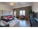 Comfortable living room with hardwood floors, exposed brick wall and natural light at 52 Buena Vista Se Cir, Cartersville, GA 30121