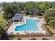 Aerial view of a large community pool with lounge seating at 11880 Wexford Club Dr, Roswell, GA 30075