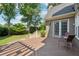 Back deck with outdoor seating, and direct access to the backyard at 11880 Wexford Club Dr, Roswell, GA 30075