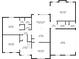 Detailed floor plan showcasing the layout of the first floor including kitchen, living spaces, and garage at 11880 Wexford Club Dr, Roswell, GA 30075