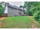 Spacious backyard featuring a lush lawn, perfect for outdoor activities and relaxation at 2314 Robin Dr, Loganville, GA 30052