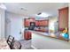 Bright, functional kitchen with appliances, breakfast bar, and easy access to dining area at 2314 Robin Dr, Loganville, GA 30052