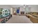 Basement featuring a stone fireplace, large TV, and comfortable seating area at 100 Chestnut Hill Dr, Canton, GA 30114