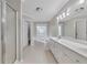 Bathroom showcasing a soaking tub, shower, and double sink vanity at 100 Chestnut Hill Dr, Canton, GA 30114