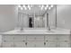 Bright bathroom features a double sink vanity and ample cabinet space at 100 Chestnut Hill Dr, Canton, GA 30114
