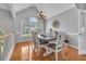 Dining room with hardwood floors, large window and stylish decor at 100 Chestnut Hill Dr, Canton, GA 30114