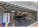 Spacious garage with epoxy flooring and ample storage for a boat and equipment at 100 Chestnut Hill Dr, Canton, GA 30114
