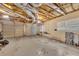 Large garage with unfinished ceiling and ample storage and parking space at 100 Chestnut Hill Dr, Canton, GA 30114