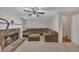 Living room featuring a stone fireplace, comfortable sectional sofa at 100 Chestnut Hill Dr, Canton, GA 30114