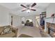 Spacious living room boasts a stone fireplace and comfortable seating at 100 Chestnut Hill Dr, Canton, GA 30114
