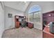 Office space with natural light, built in cabinets and a ceiling fan at 100 Chestnut Hill Dr, Canton, GA 30114