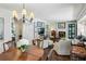 Bright and inviting open-concept living room with hardwood floors and dining area at 111 Terrace Ne Dr, Atlanta, GA 30305