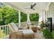Relaxing porch furnished with comfortable wicker seating and a ceiling fan, offering a serene outdoor space at 111 Terrace Ne Dr, Atlanta, GA 30305
