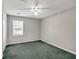 Cozy bedroom with neutral walls, carpet, and a window at 1510 Summer Lake Ter, Loganville, GA 30052