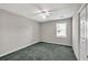Cozy bedroom with neutral walls, carpet, and a window at 1510 Summer Lake Ter, Loganville, GA 30052