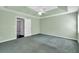 Large bedroom with a tray ceiling, fan, neutral walls and plush green carpeting at 1510 Summer Lake Ter, Loganville, GA 30052