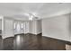Bright living room featuring hardwood floors and an entry door with decorative glass at 1510 Summer Lake Ter, Loganville, GA 30052
