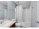 Cozy bathroom featuring a shower-tub combination and a single vanity with a neutral-toned countertop at 154 Stephens Mill Dr, Dallas, GA 30157