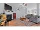 Cozy living room featuring a fireplace, comfortable seating, and an open layout with lots of natural light at 154 Stephens Mill Dr, Dallas, GA 30157