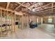 Unfinished basement with exposed ceiling joists and stud walls, offering potential for customization at 2245 Long Bow Chase, Kennesaw, GA 30144