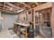Unfinished basement area featuring a workbench, tool storage, and open layout at 2245 Long Bow Chase, Kennesaw, GA 30144