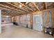 Partially finished basement showing framing and utilities with walk-out door to the exterior at 2245 Long Bow Chase, Kennesaw, GA 30144