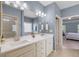 Bathroom featuring dual sinks, quartz countertops, and a separate shower and tub at 2245 Long Bow Chase, Kennesaw, GA 30144