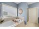 This bathroom features a tub with tile surround, as well as a separate shower at 2245 Long Bow Chase, Kennesaw, GA 30144