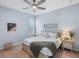 Comfortable bedroom with a queen-size bed, neutral decor, and natural light from a window at 2245 Long Bow Chase, Kennesaw, GA 30144